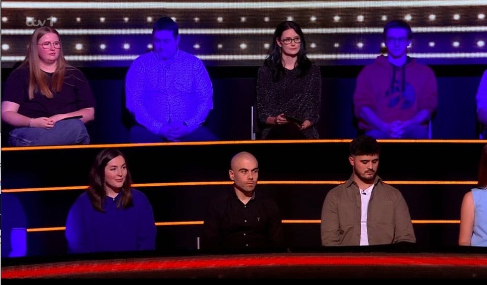 Contestants on the game show, 1% Club.