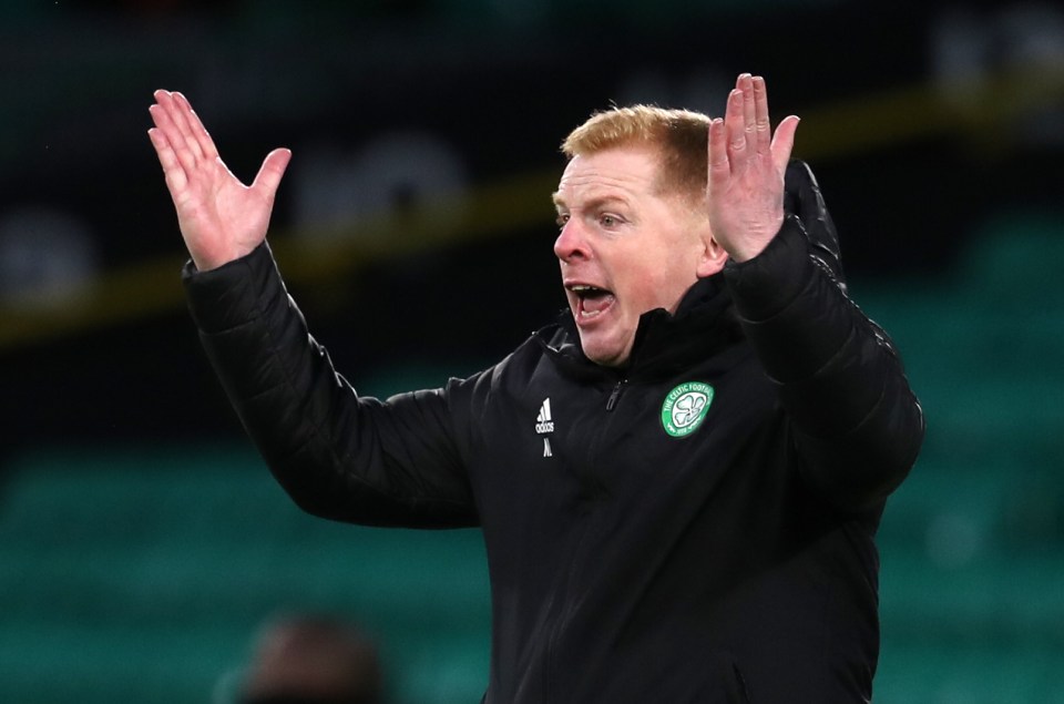 Neil Lennon, Celtic manager, gesturing intensely.