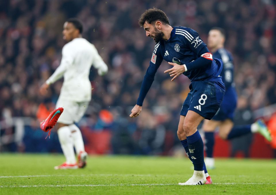 Bruno Fernandes of Manchester United throws his boot down in frustration.