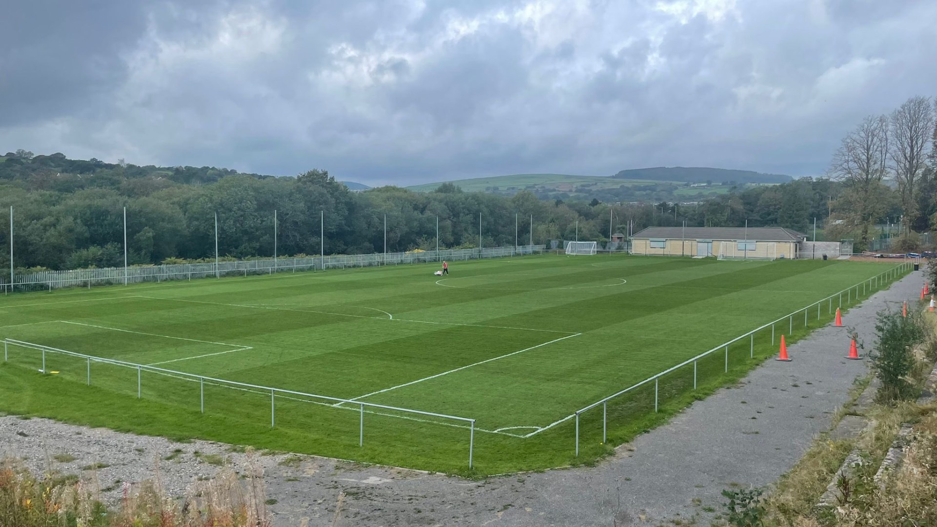 Footballer rushed to hospital and opponent arrested as shock 'out of the blue' attack sees match abandoned