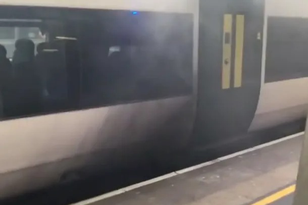 Gatwick Airport rail station evacuated after train catches fire with smoke seen pouring from under carriage