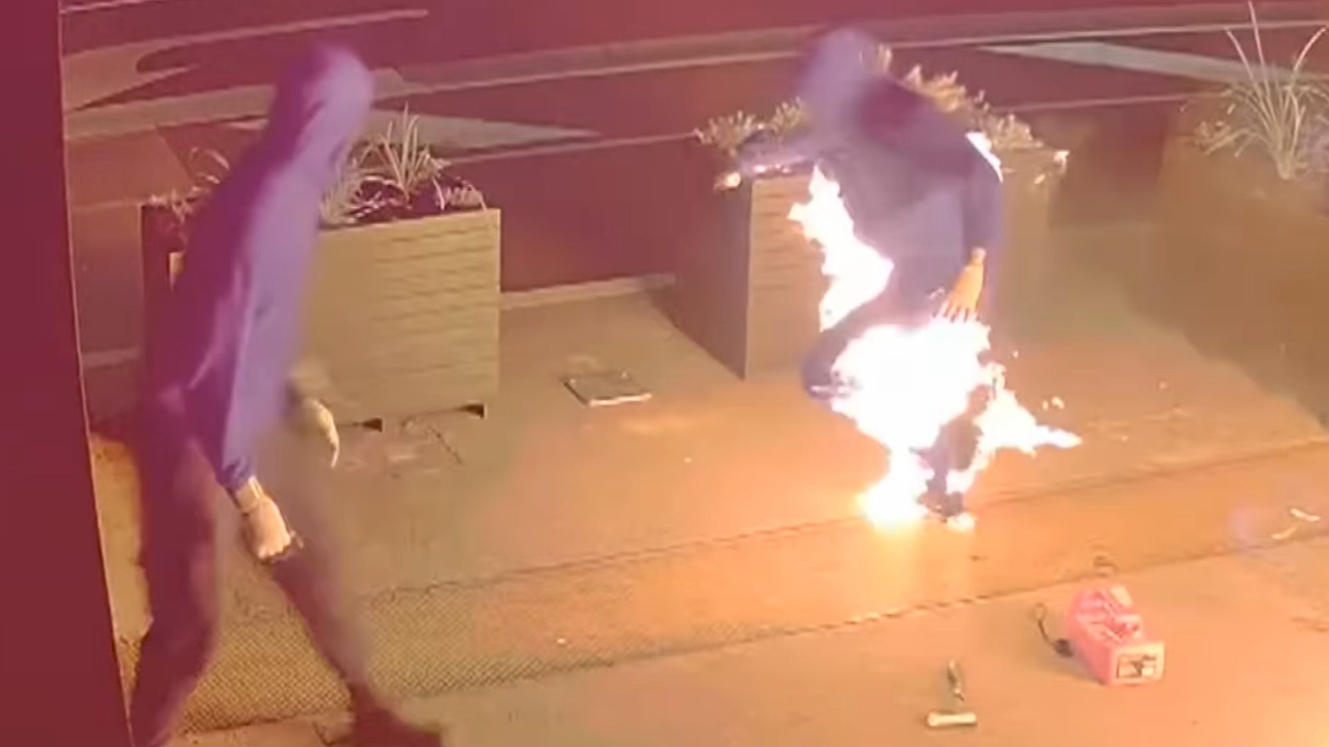 Watch moment bungling arsonist sets his own TROUSERS on fire & has to ditch them as he hot-foots from crime scene